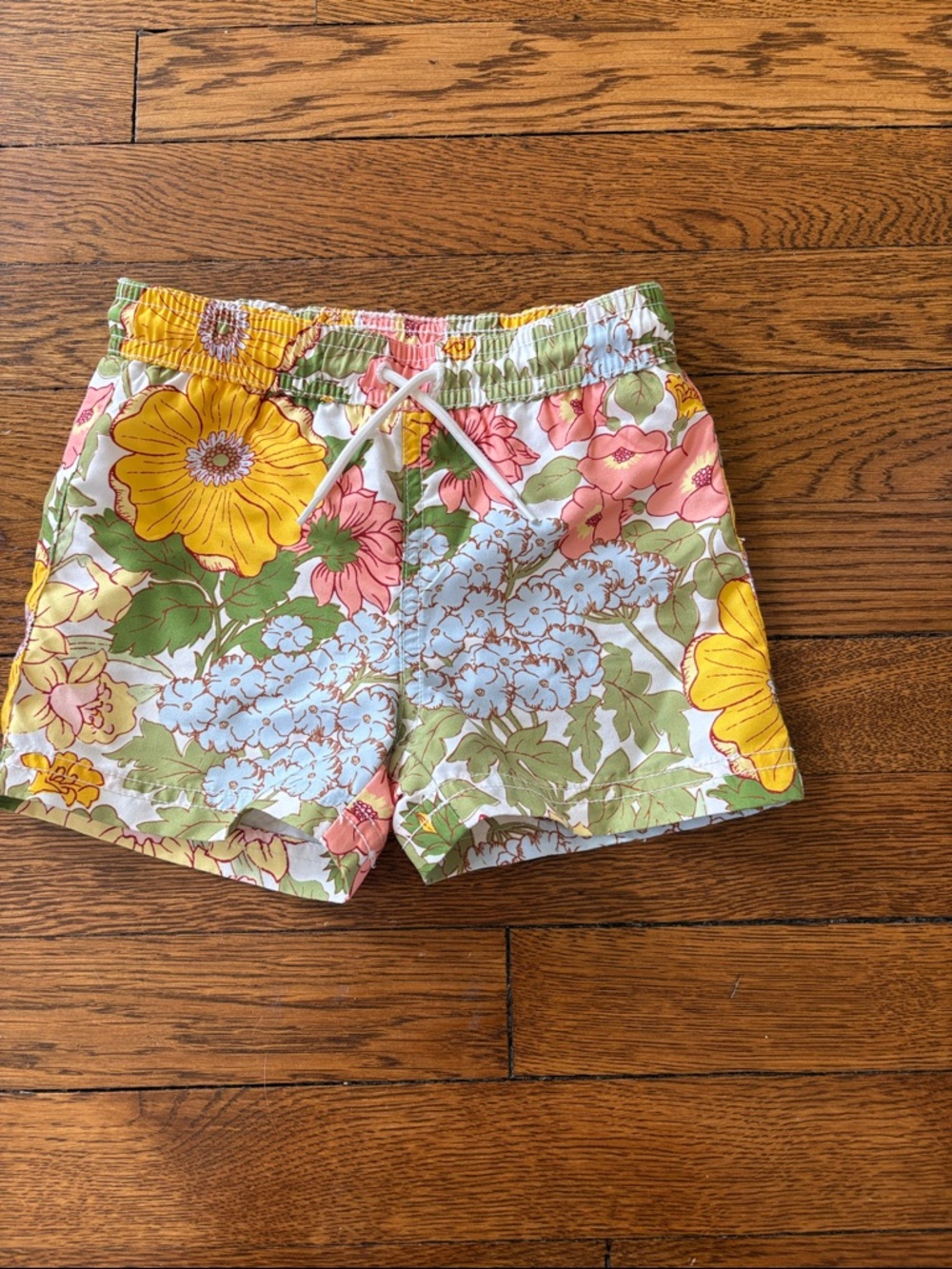 Janie & Jack Floral Drawstring Swim Trunks in Yellow, Pink, Blue & Green.